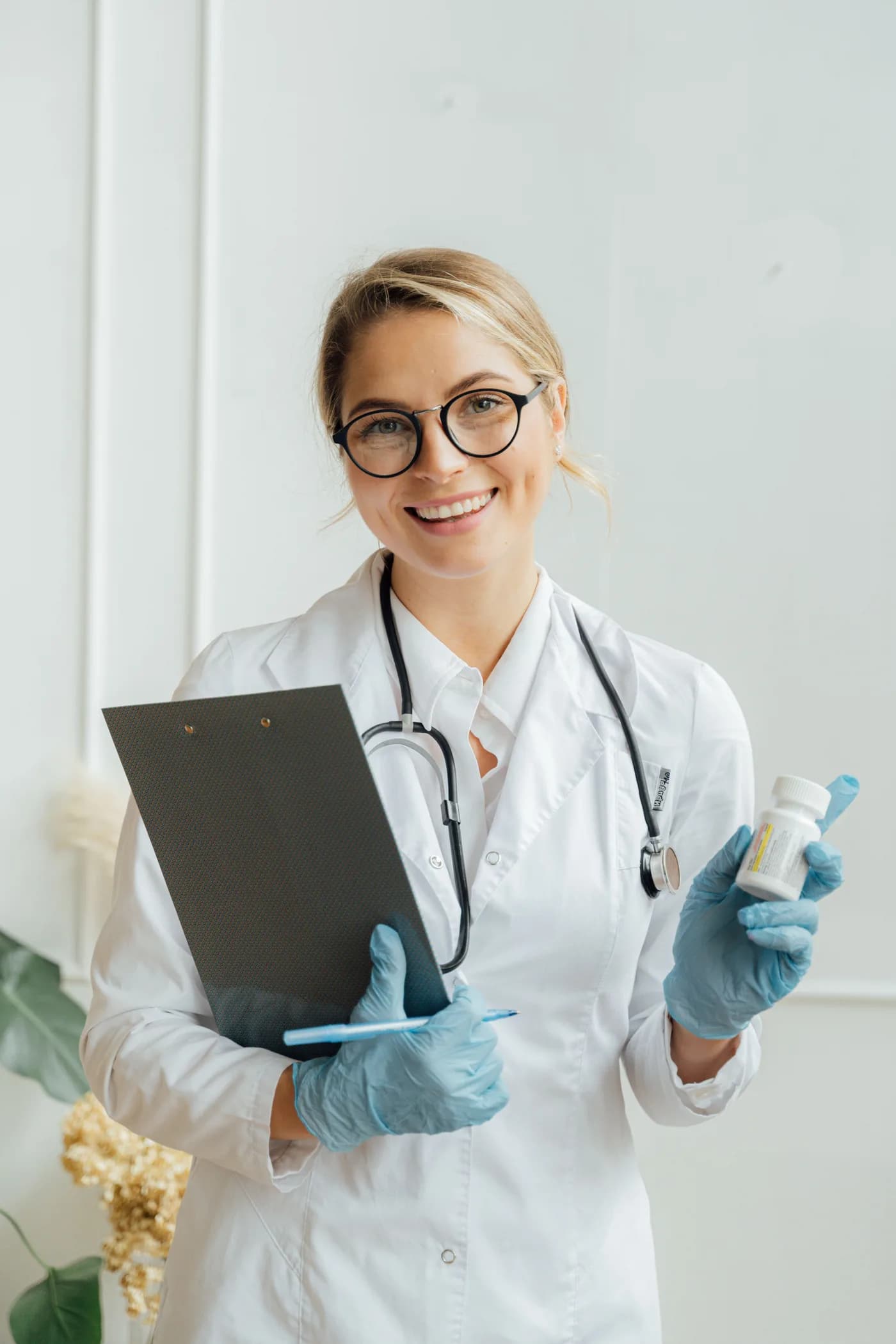 A Pinecrest Clinic doctor holding a chart
